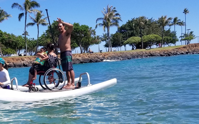 Adaptive Freedom Foundation Paddle Day with Muscular Dystrophy Association Banner
